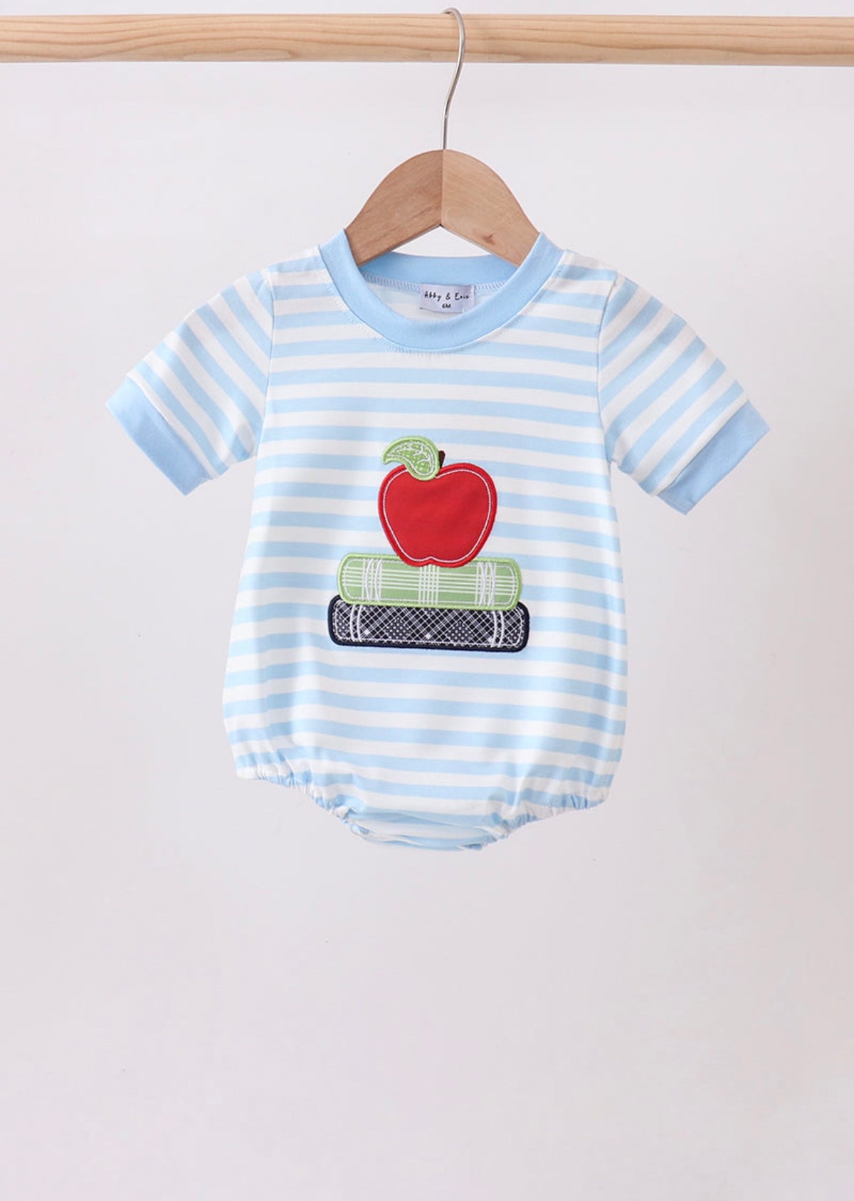 Stripped apple book bubble boy school